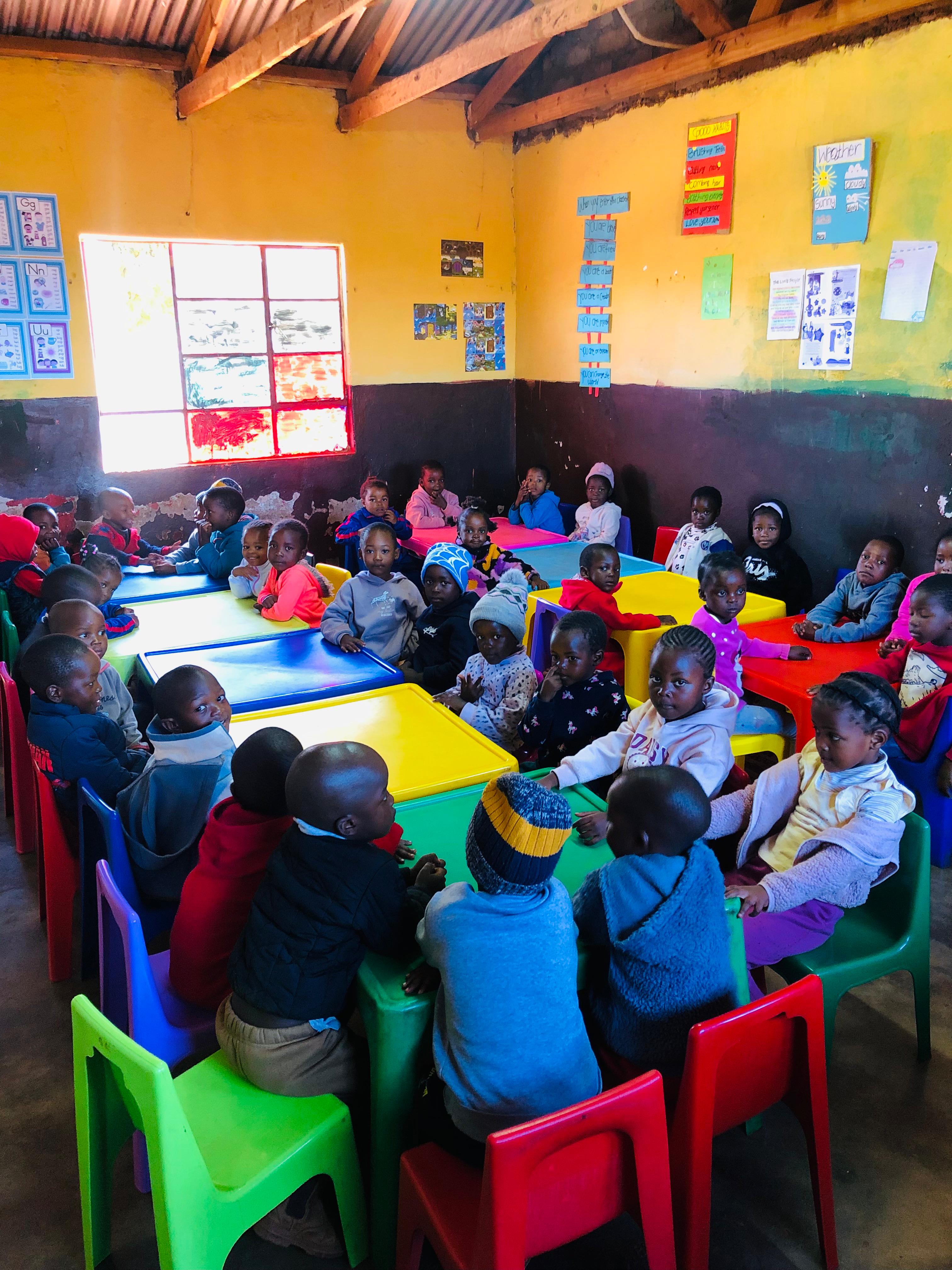 Children learning together at a classroom table